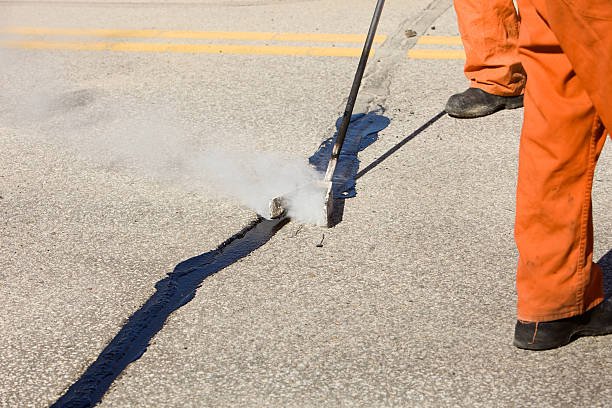 The Complete 2025 Guide to Protecting Your Asphalt Investment 1 Asphalt maintenance
